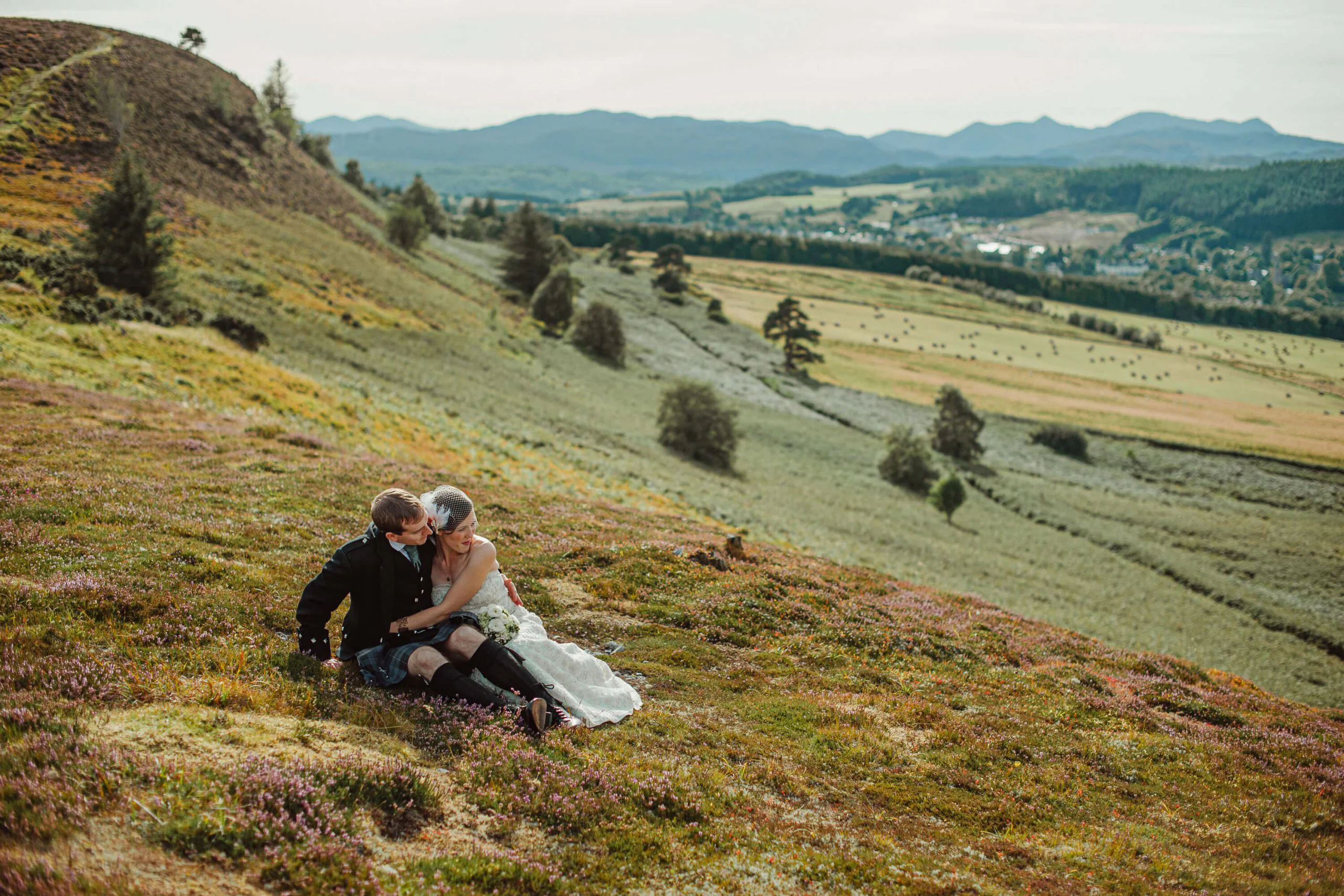 Wedding couple photographed in the dramatic Scottish landscape