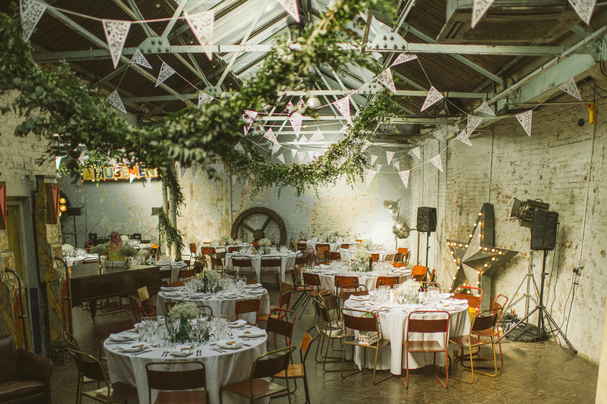 Industrial wedding venue interior at MC Motors in Dalston