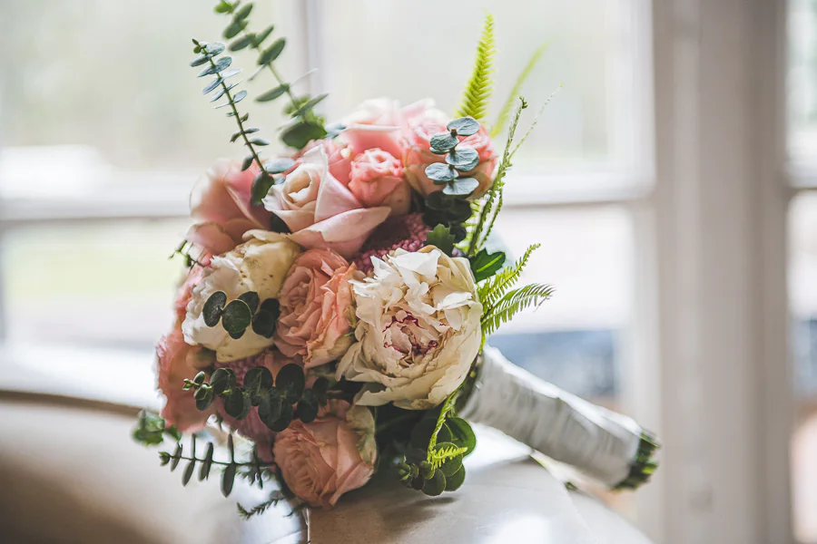 All shades of pink roses wedding bouquet
