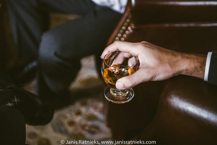 Cuban rum being poured during the groom’s preparations
