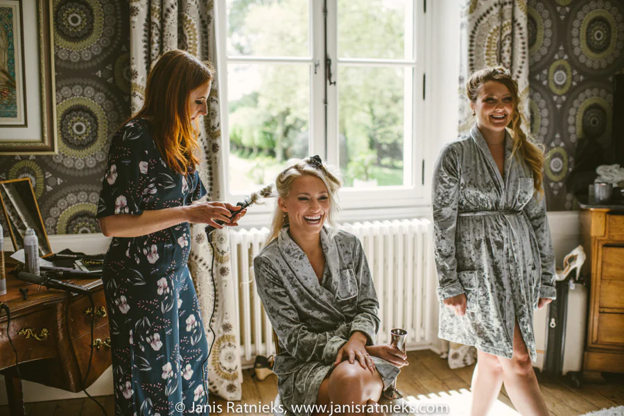 Bridal hairstyling during Rebecca’s wedding preparations