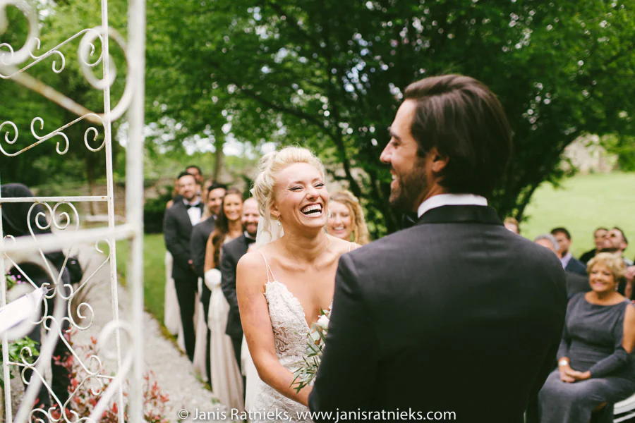 Ramon seeing Rebecca arrive beneath the garden ceremony arch