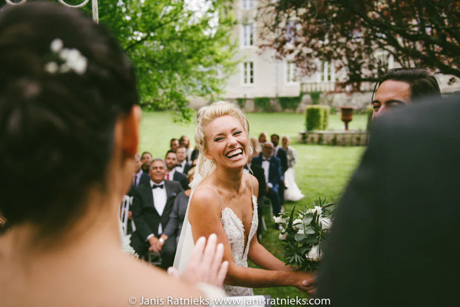 Rebecca laughing during the Château de la Borderie ceremony