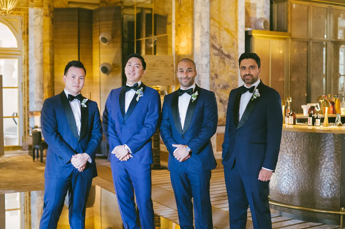 Groom's pre-wedding toast captured at Hotel Crillon, a heartwarming moment before the celebration