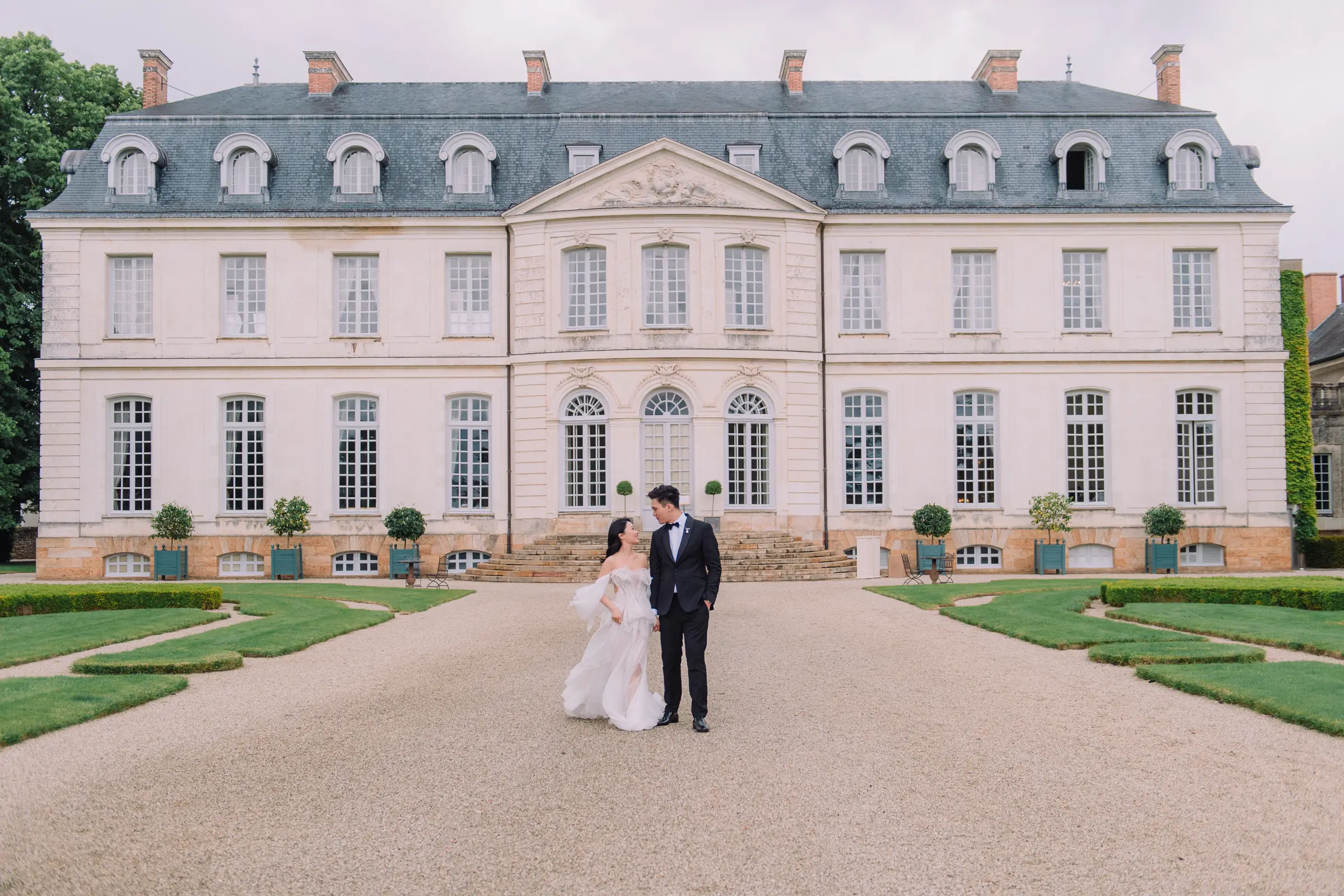 Couple portrait at a château wedding in France for Loire Valley wedding inspiration