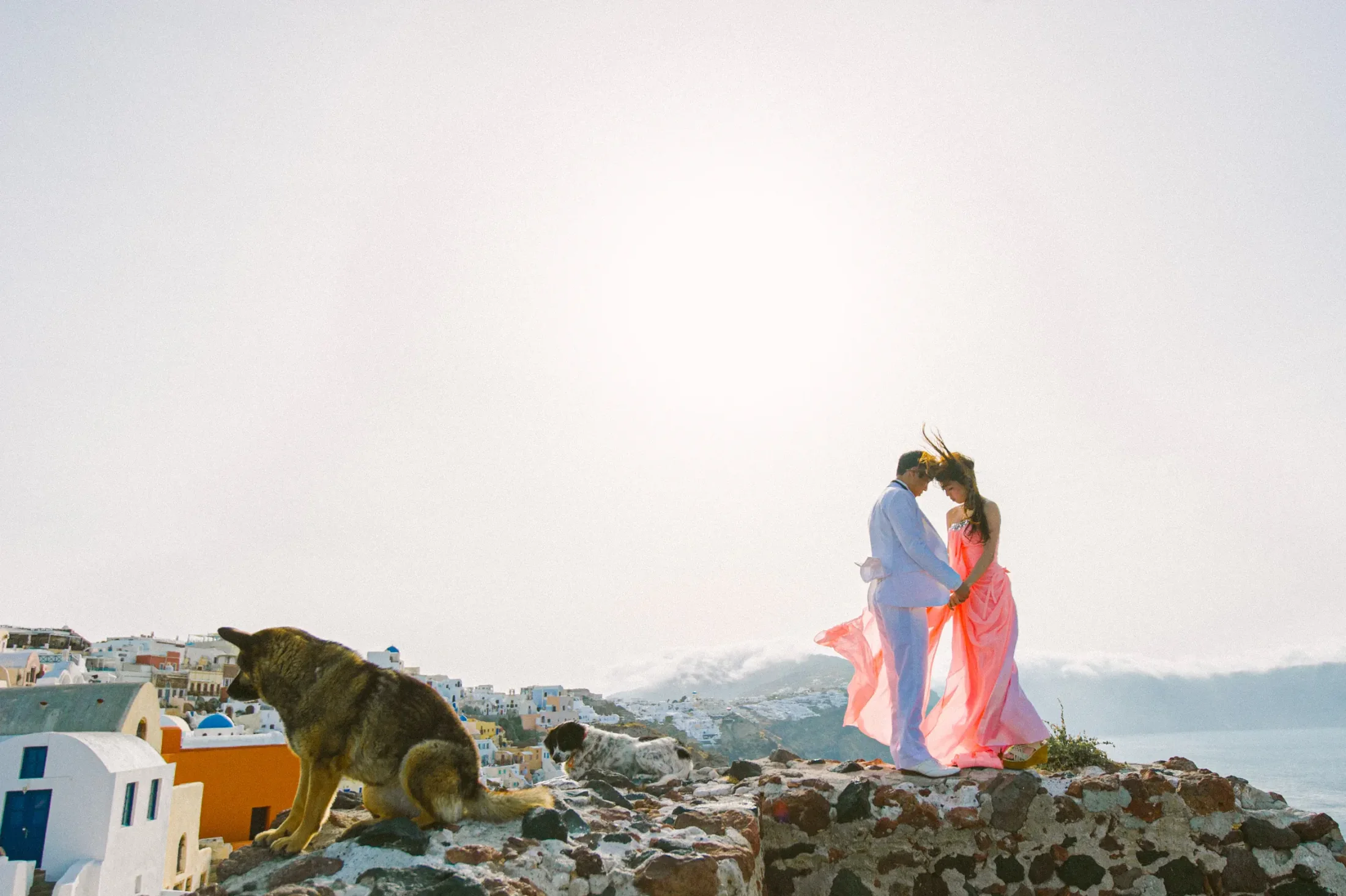 Lorne and Wing photographed on Santorini during their destination pre-wedding session