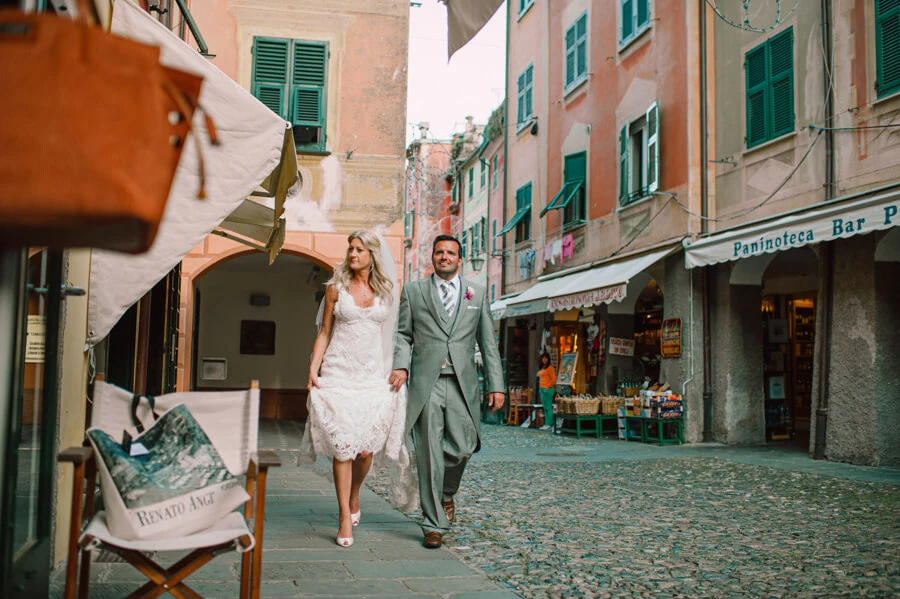Anna and Brian walking through a narrow street in Portofino