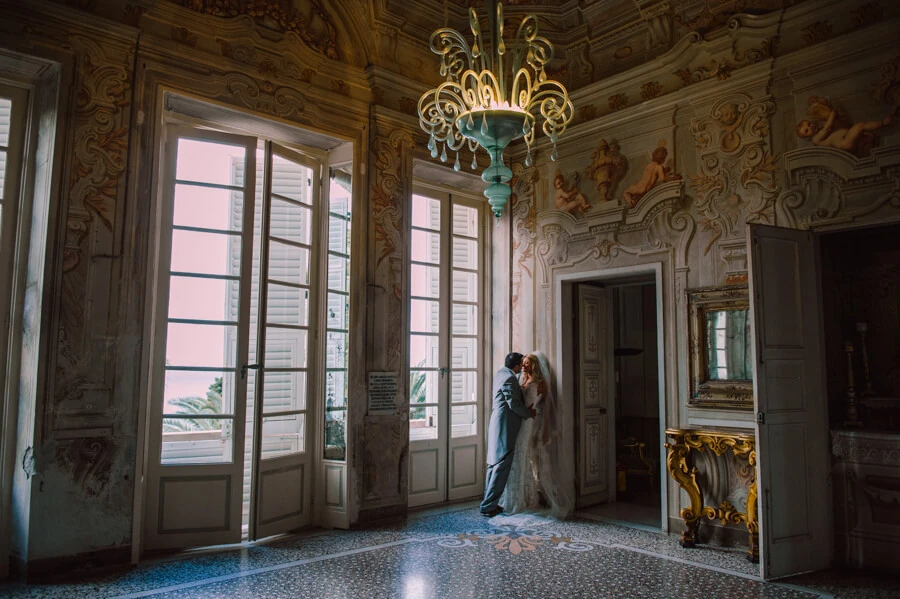Anna and Brian photographed in one of Villa Durazzo’s historic rooms