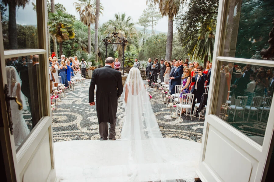 Anna and her father entering the Villa Durazzo garden ceremony