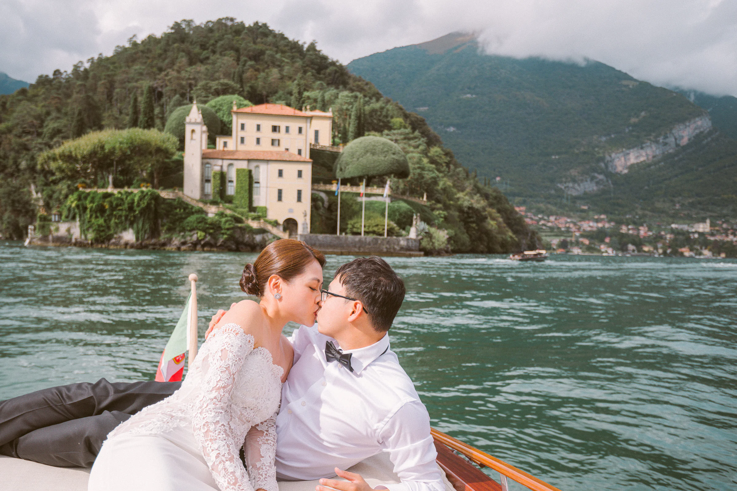 Jane and Lucas on Lake Como during their Riva boat elopement portraits, photograph 26