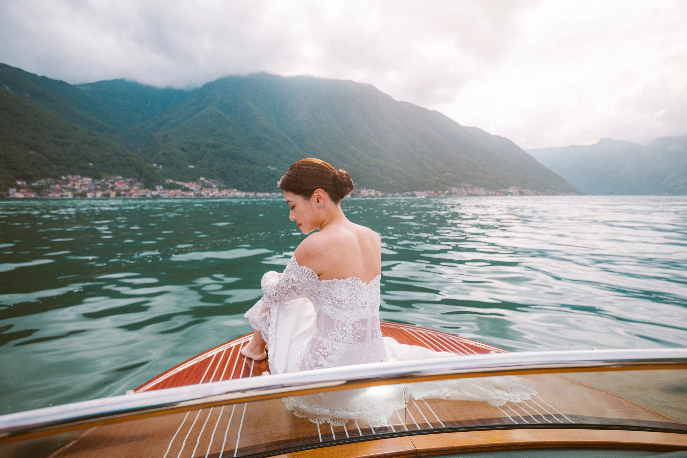 Jane and Lucas on Lake Como during their Riva boat elopement portraits, photograph 27