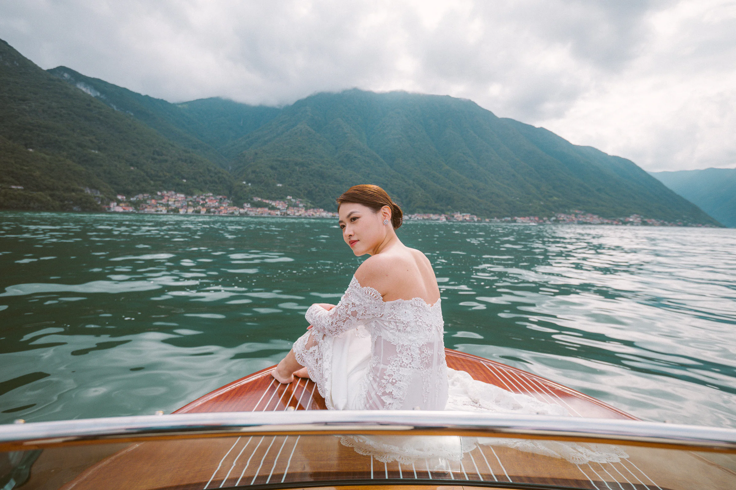 Jane and Lucas on Lake Como during their Riva boat elopement portraits, photograph 28