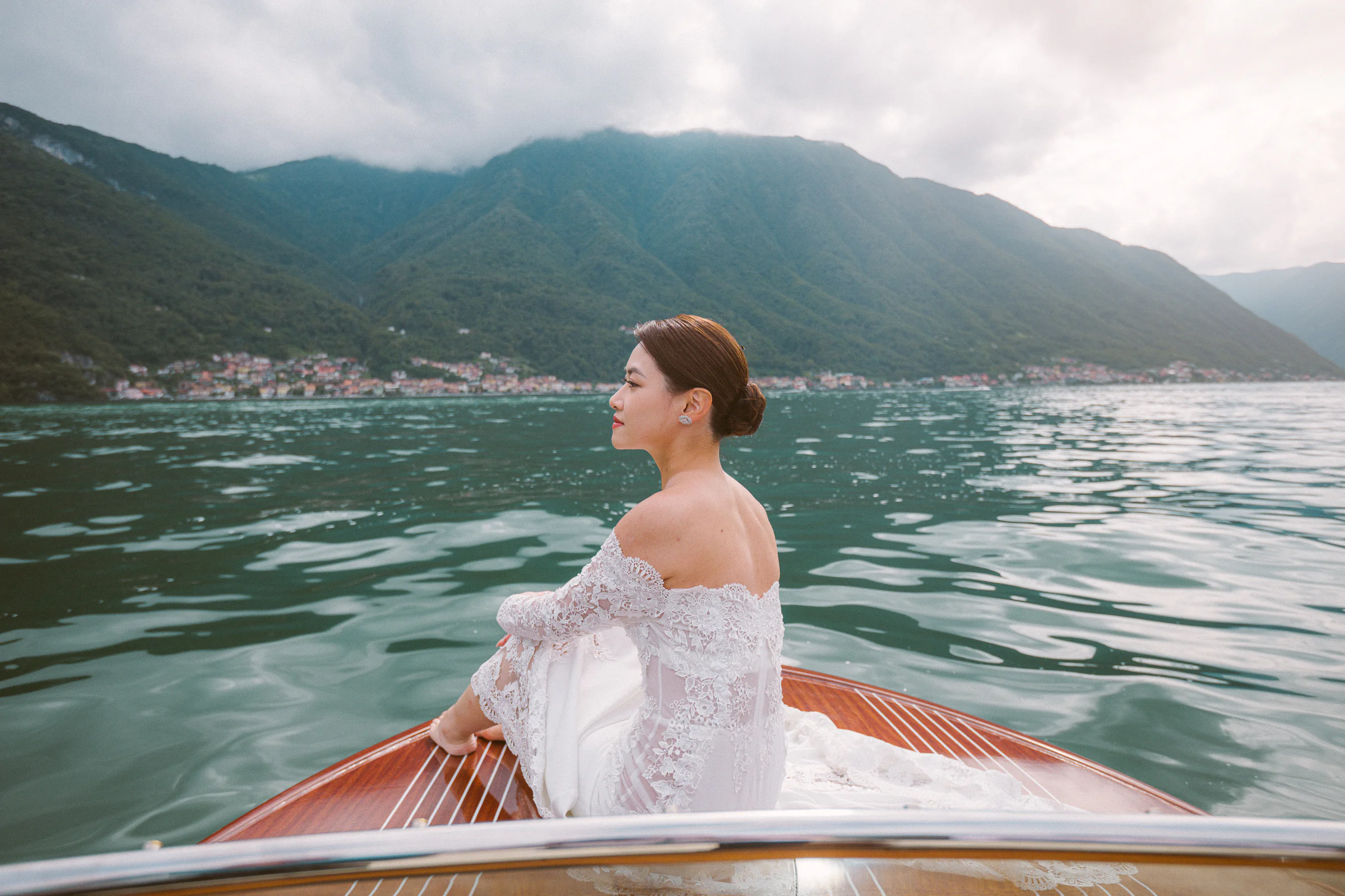 Jane and Lucas on Lake Como during their Riva boat elopement portraits, photograph 29