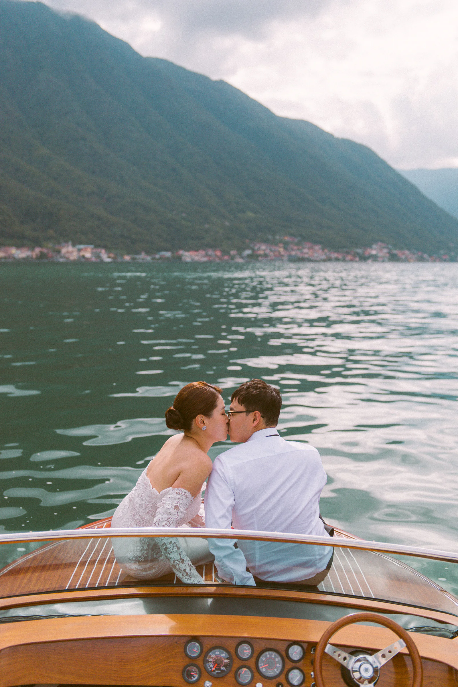 Jane and Lucas on Lake Como during their Riva boat elopement portraits, photograph 31