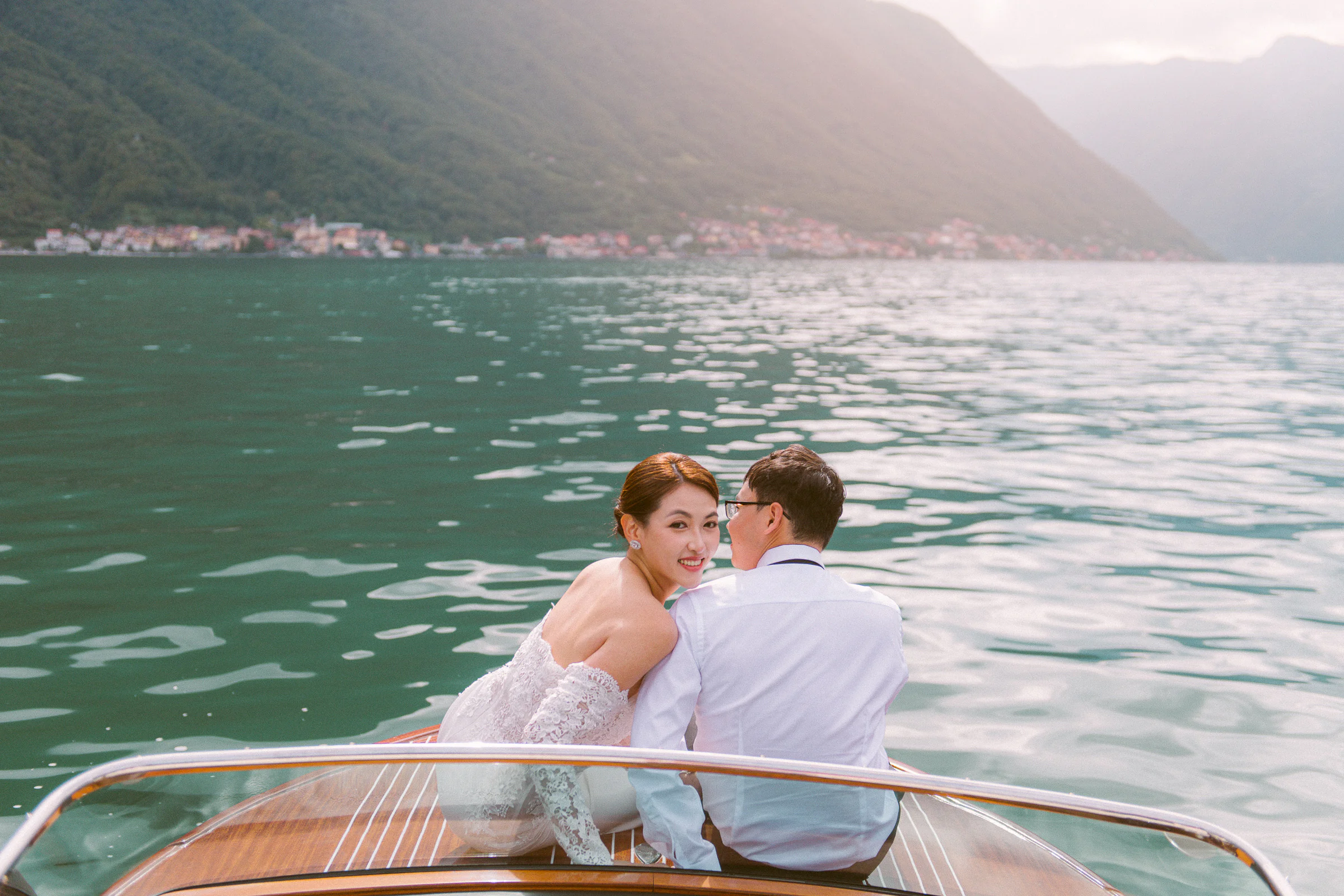 Jane and Lucas on Lake Como during their Riva boat elopement portraits, photograph 32