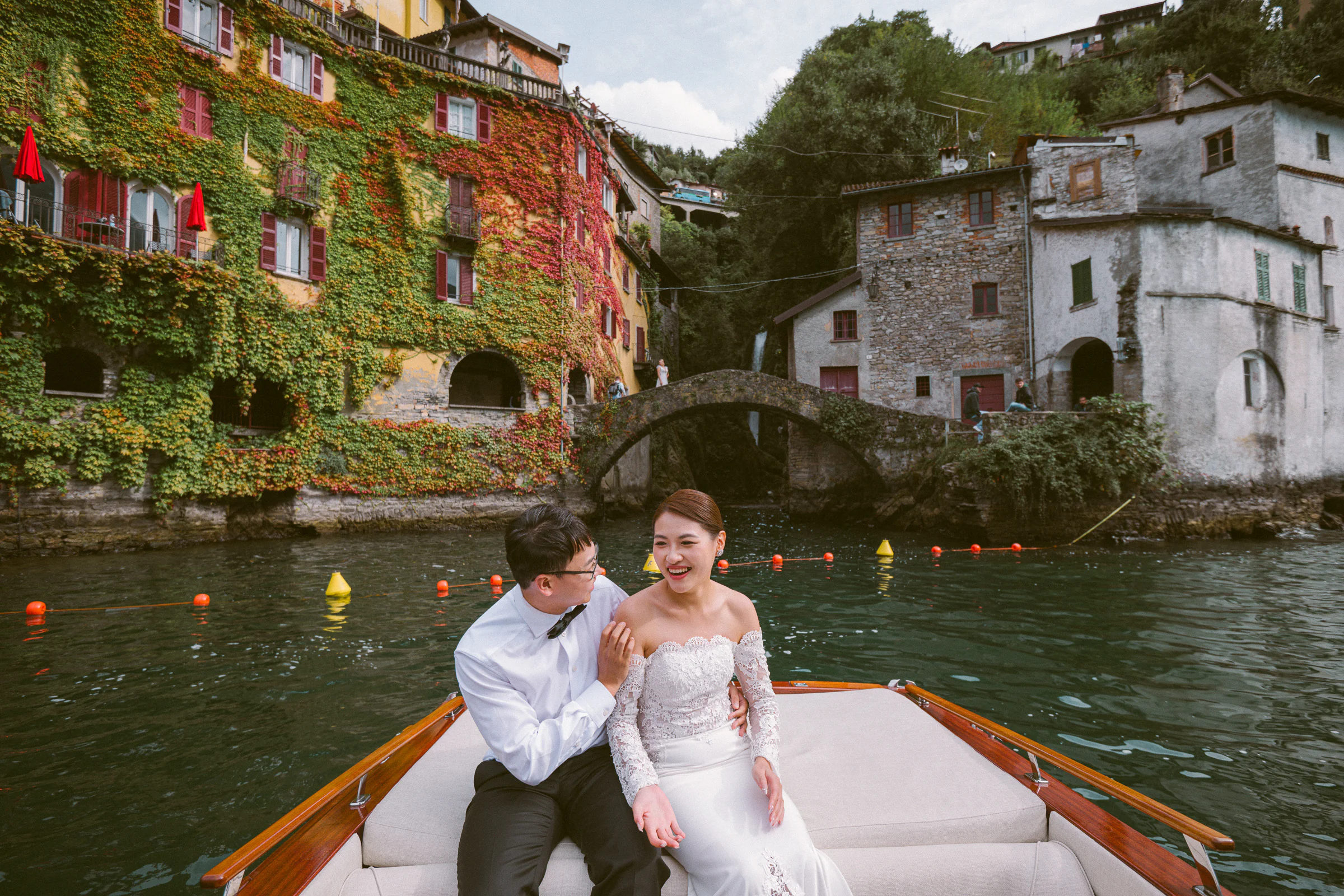 Jane and Lucas on Lake Como during their Riva boat elopement portraits, photograph 33