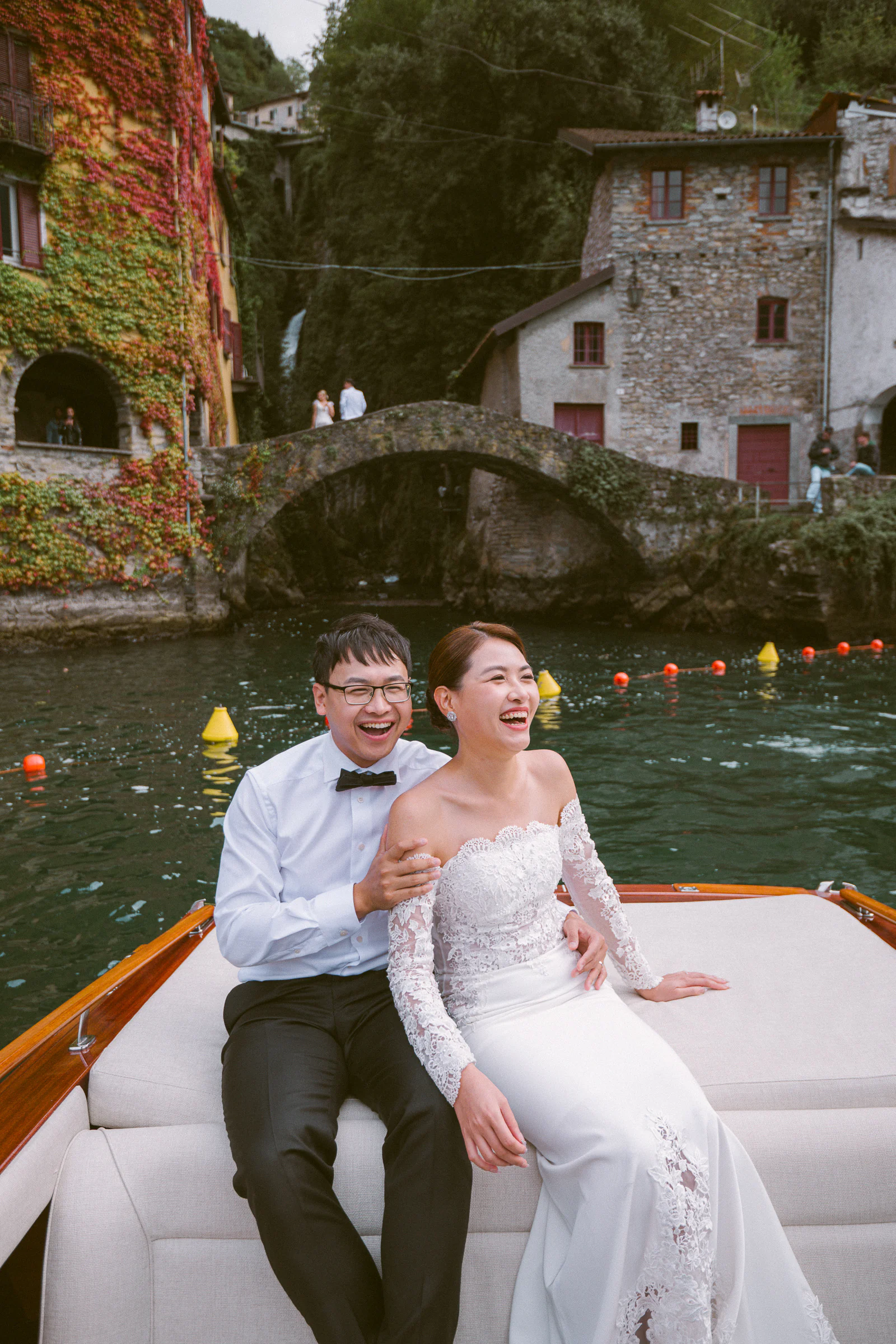 Jane and Lucas on Lake Como during their Riva boat elopement portraits, photograph 36