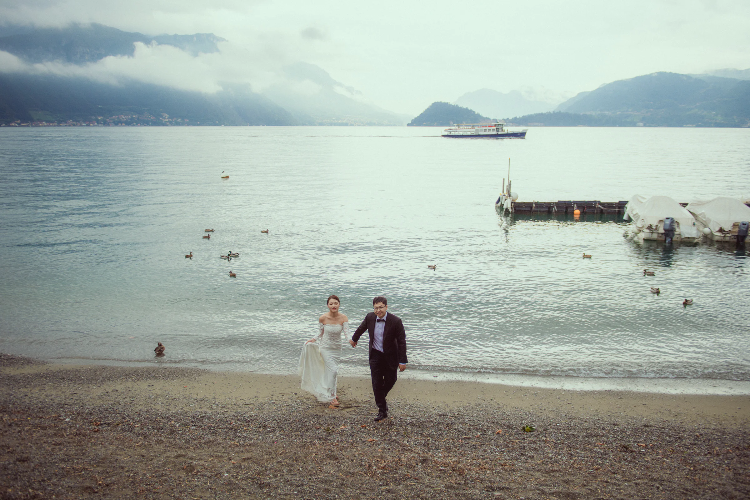 Jane and Lucas on Lake Como during their Riva boat elopement portraits, photograph 47