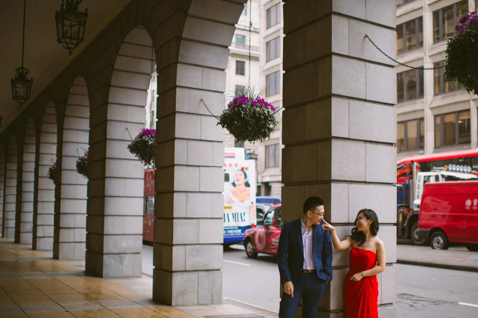 International couple photographed outside The Ritz during a London pre-wedding shoot