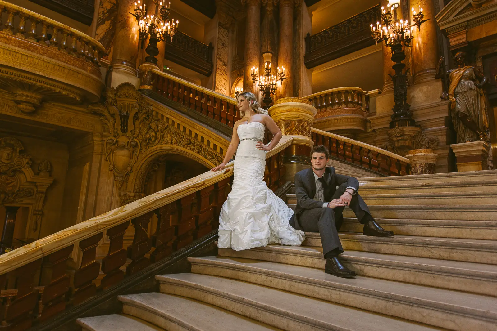 Tabitha and Nathan inside Palais Garnier during their Paris Opera pre-wedding photoshoot