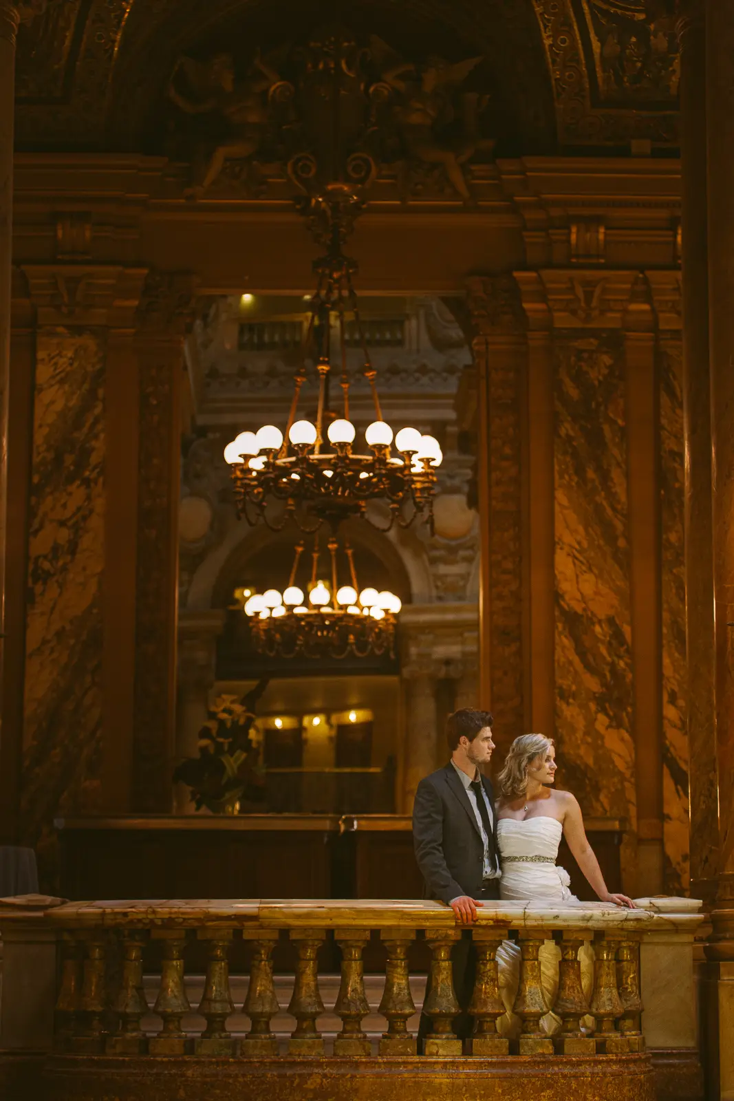 Elegant pre-wedding photography inside Palais Garnier in Paris