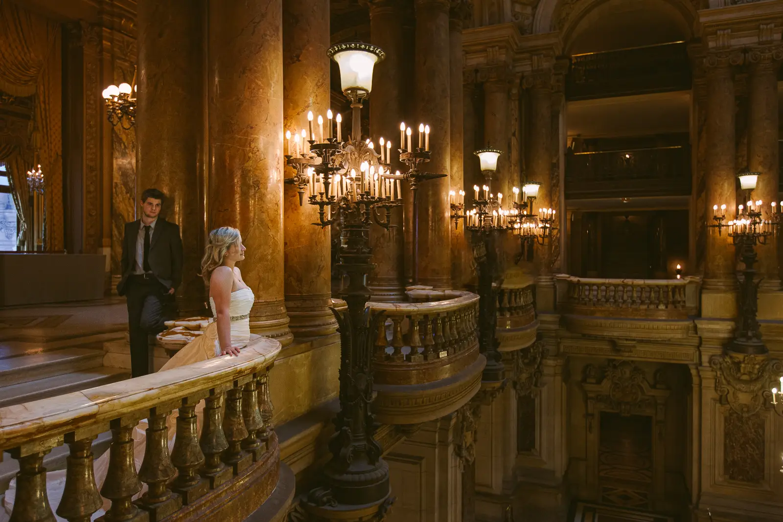 Tabitha and Nathan inside Palais Garnier during their Paris Opera pre-wedding photoshoot