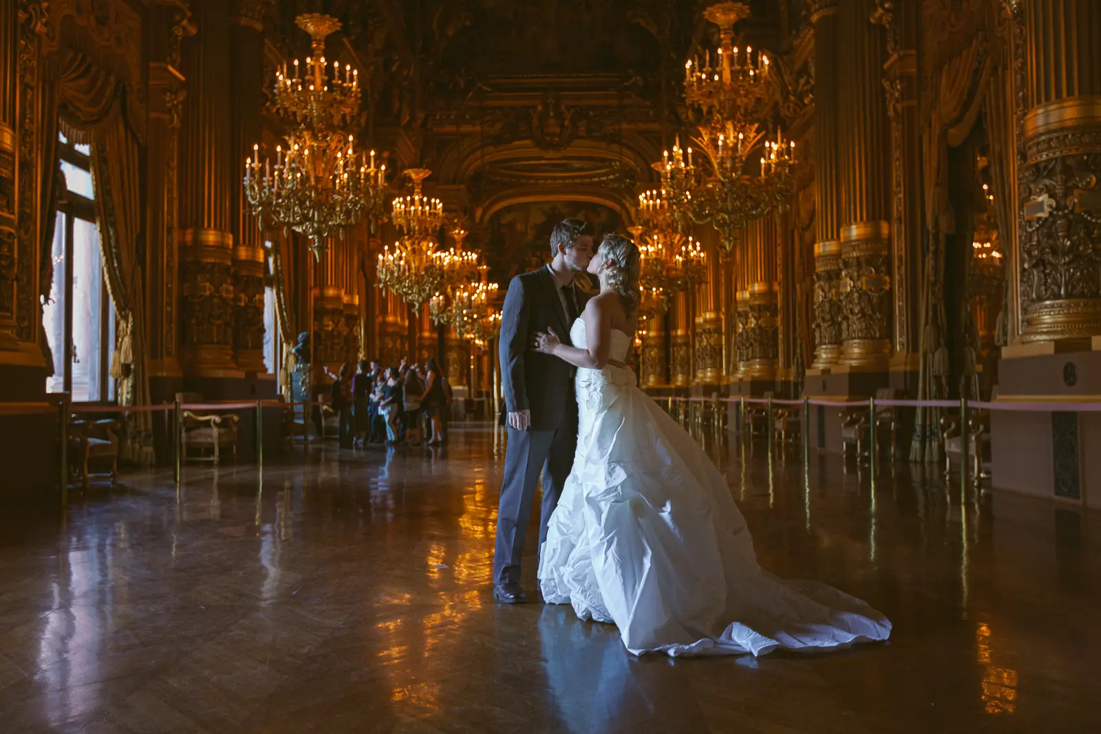 Tabitha and Nathan inside Palais Garnier during their Paris Opera pre-wedding photoshoot
