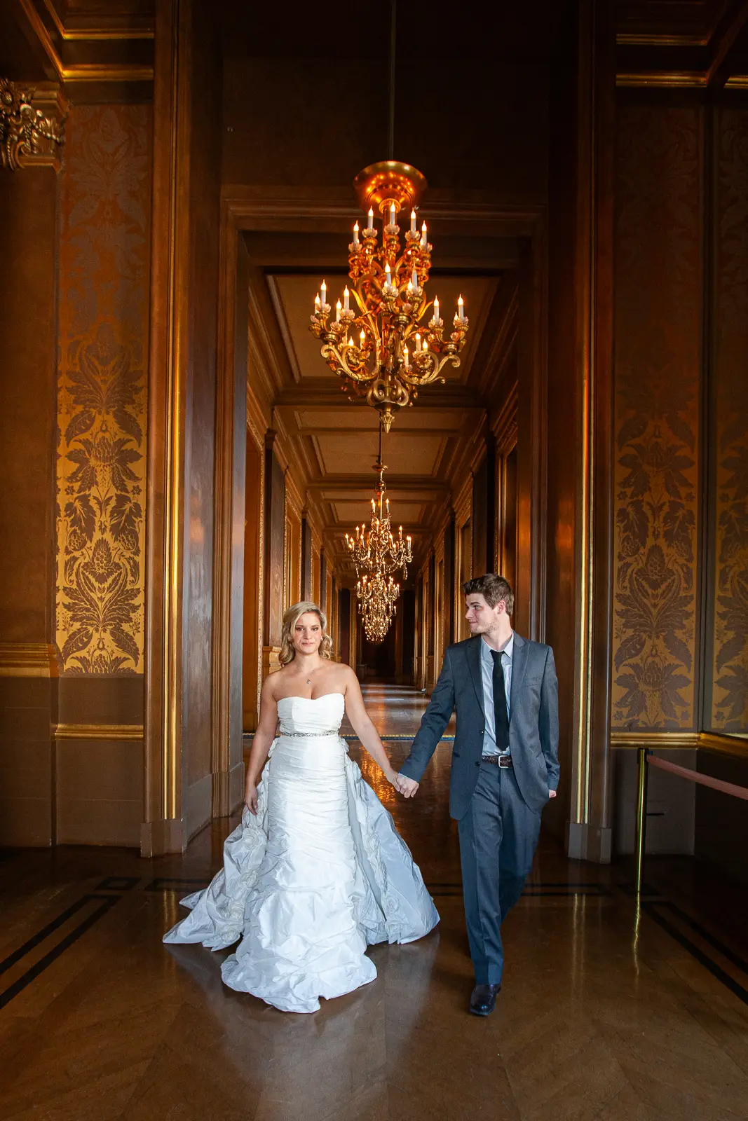 Tabitha and Nathan beneath the gilded interiors of the Paris Opera
