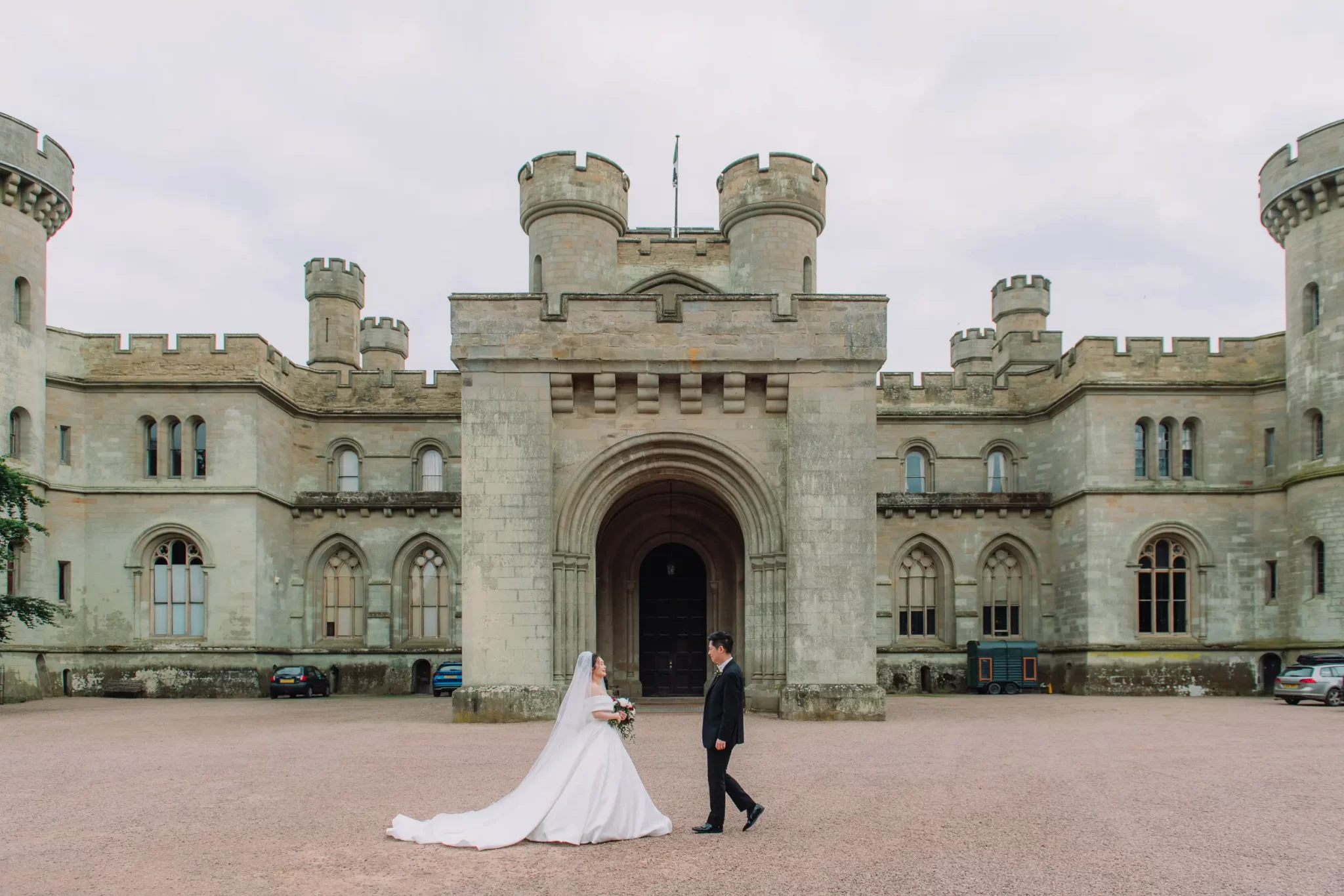 Photo of the bride and groom in EastNor Castle in Herefordshire (photo credit Janis Ratnieks)