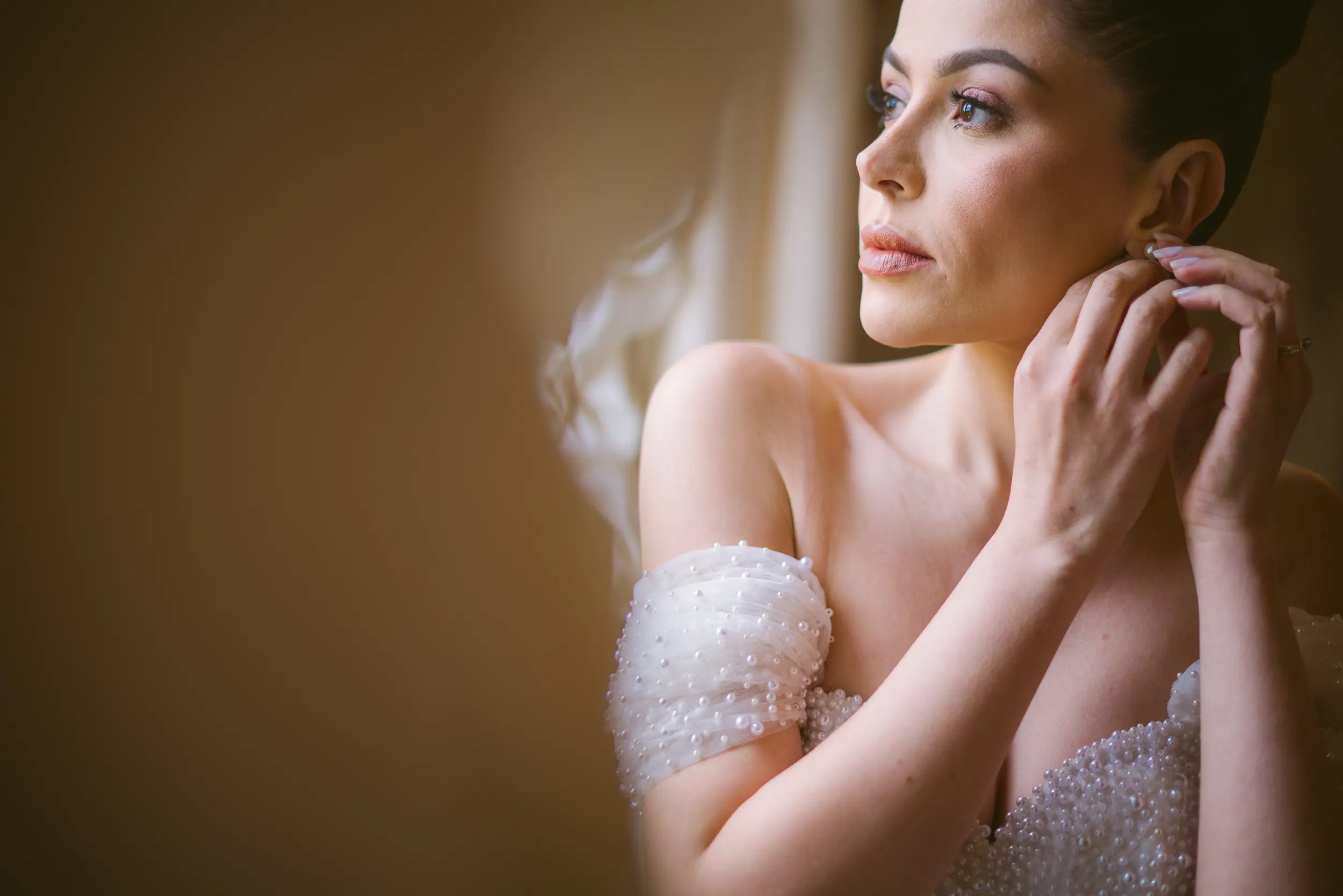 Editorial wedding ceremony photograph used as a full-width film and digital photography divider