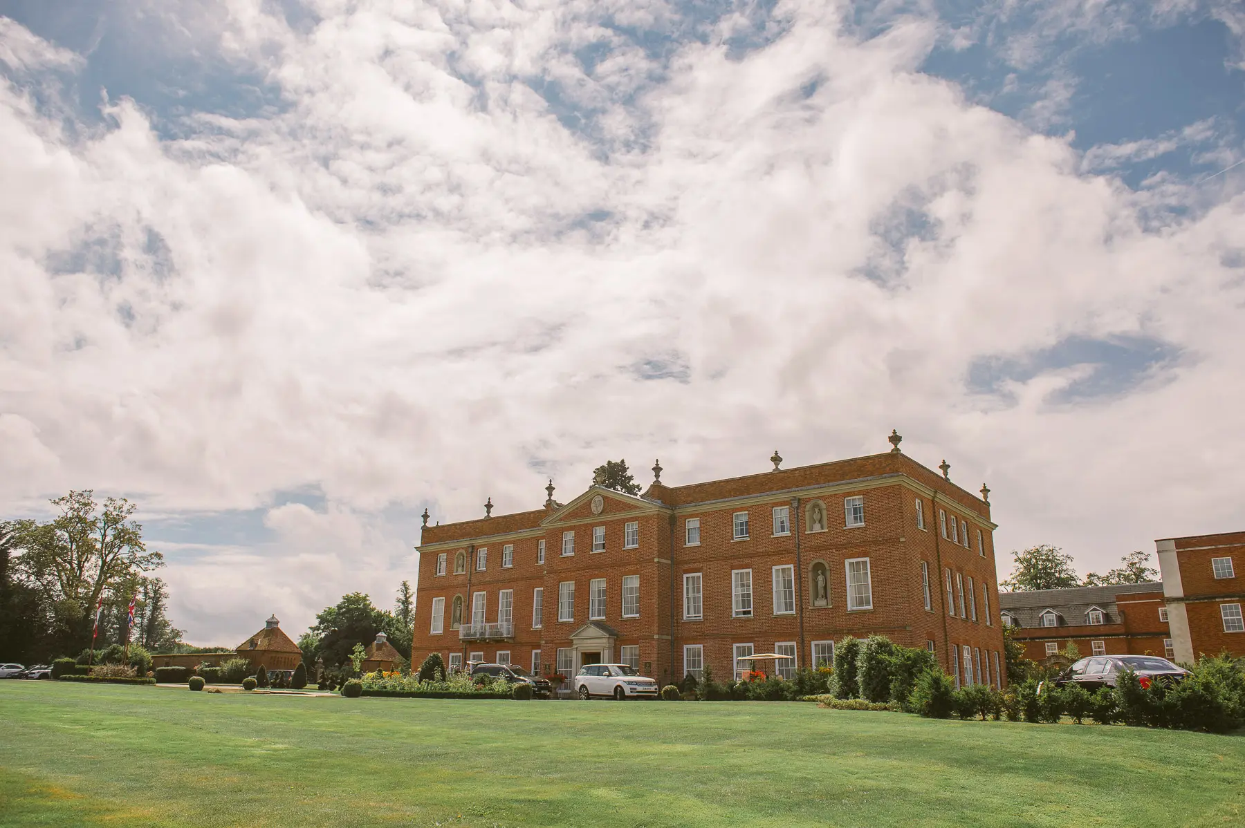 Clare and Hung’s Four Seasons Hampshire wedding, photograph 3 by Janis Ratnieks