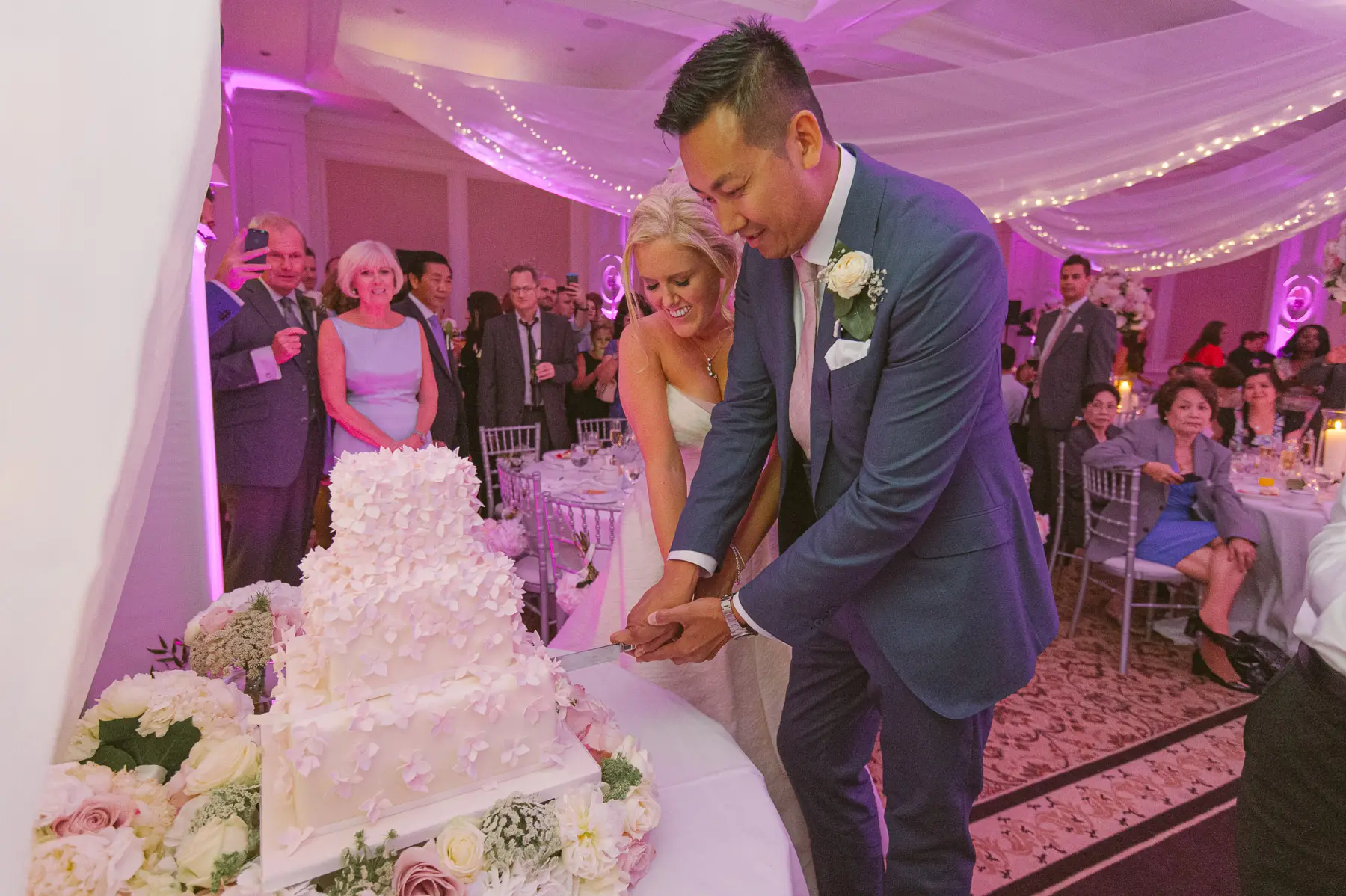 Clare and Hung’s Four Seasons Hampshire wedding, photograph 145 by Janis Ratnieks