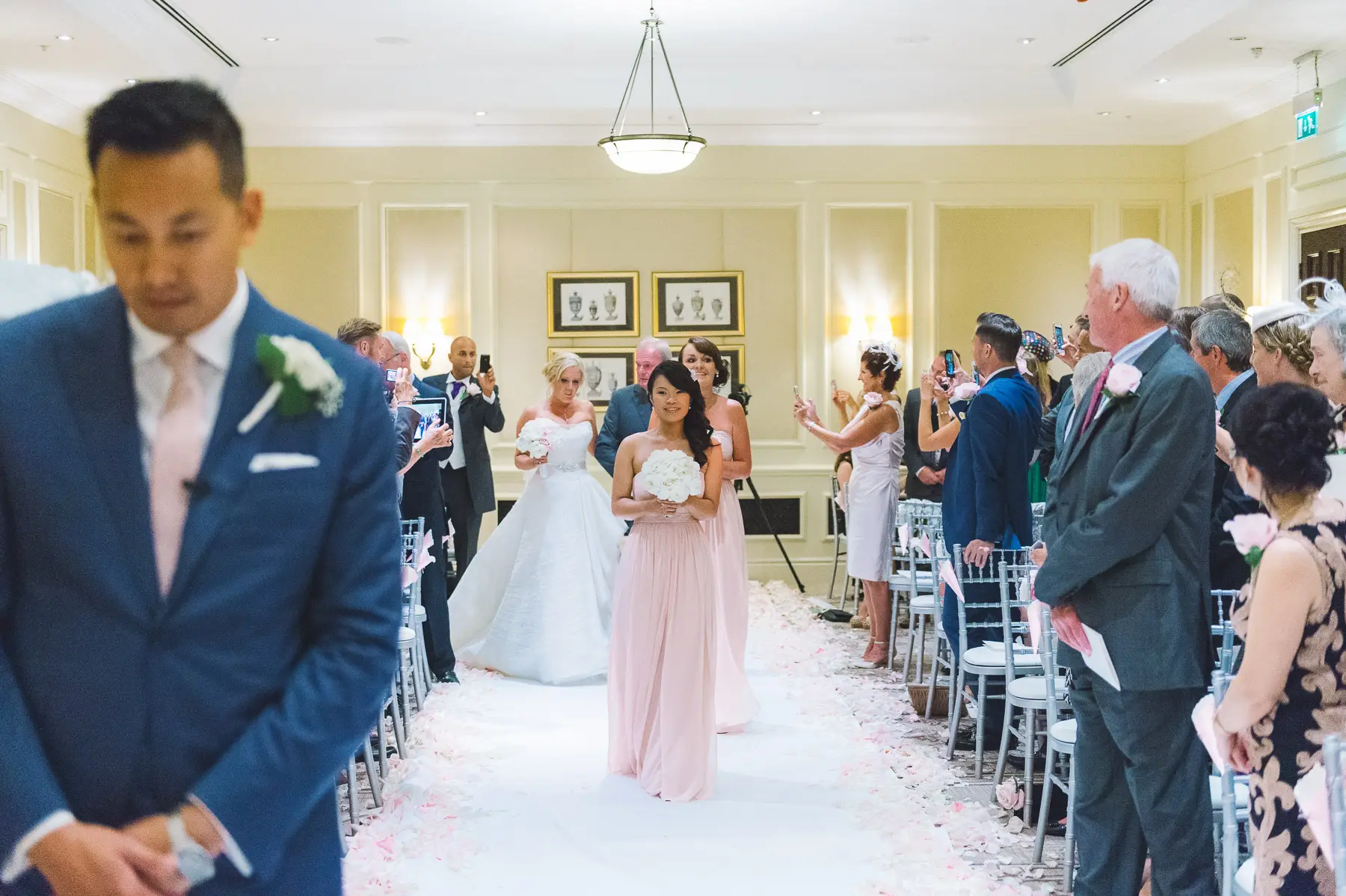 Clare and Hung’s Four Seasons Hampshire wedding, photograph 68 by Janis Ratnieks