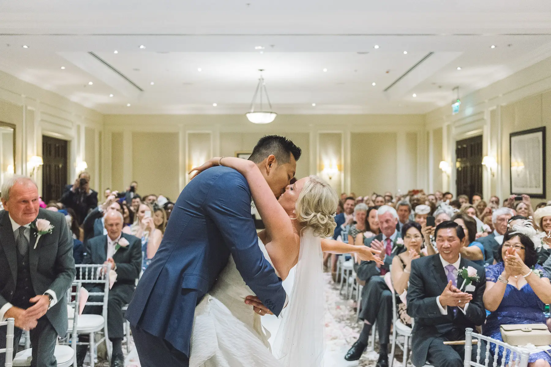 Clare and Hung’s Four Seasons Hampshire wedding, photograph 78 by Janis Ratnieks