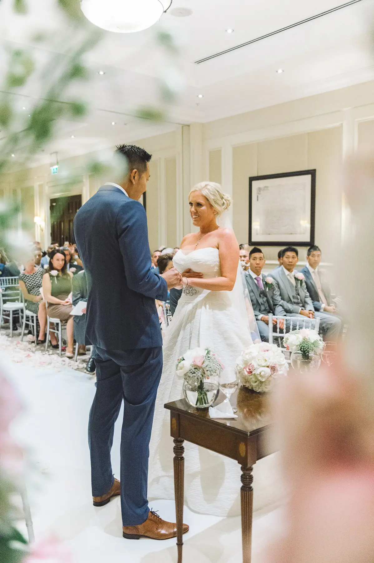 Clare and Hung’s Four Seasons Hampshire wedding, photograph 75 by Janis Ratnieks