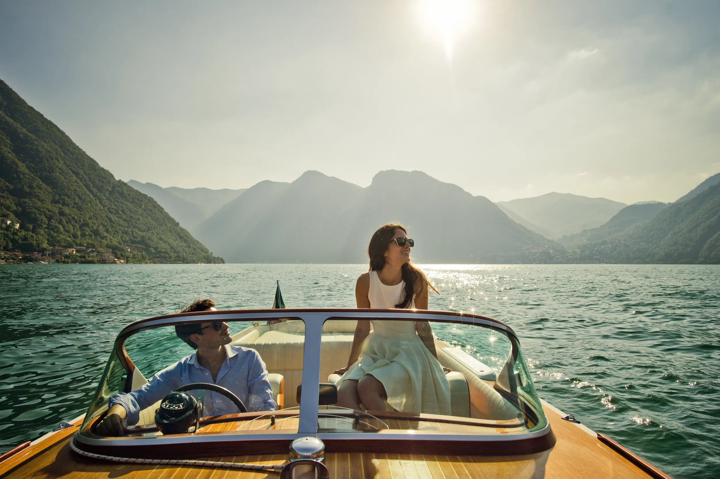 Pastel buildings and boats around a Ligurian coast harbour during a wedding