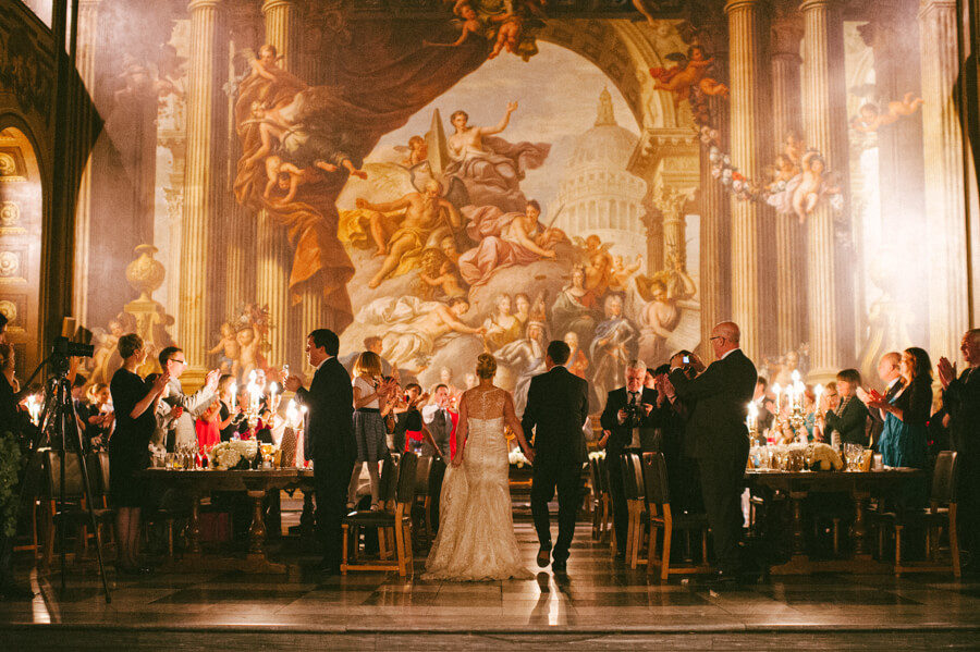 Bride and groom entering in the Painted Hall