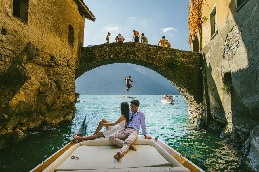 Award winning wedding photo Bride and groom on the Riva boat in Lake Como