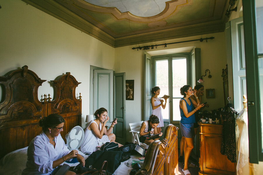 Brides maids getting ready in one room in villa in Cernobbio near lake Como
