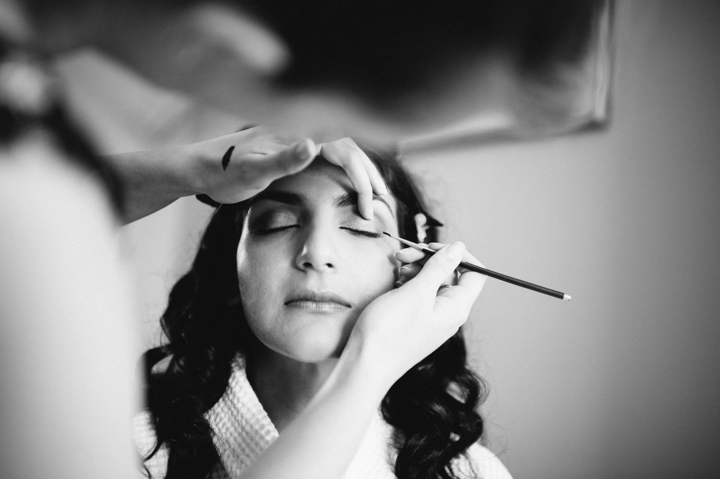 Bride's make-up is being made