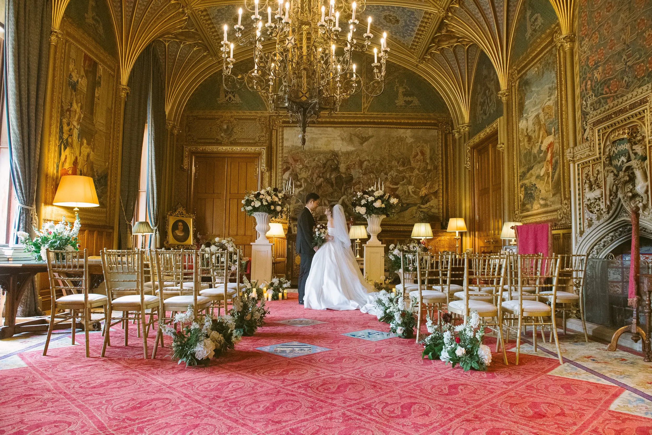 Photo of the bride and groom in EastNor Castle in Herefordshire (photo credit Janis Ratnieks)