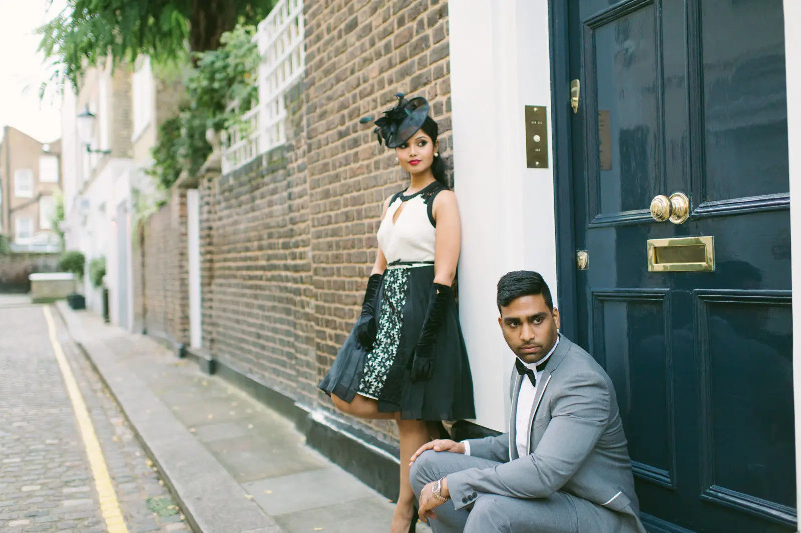 Shree and John walking narrow Chelsea lane during autumn pre-wedding London