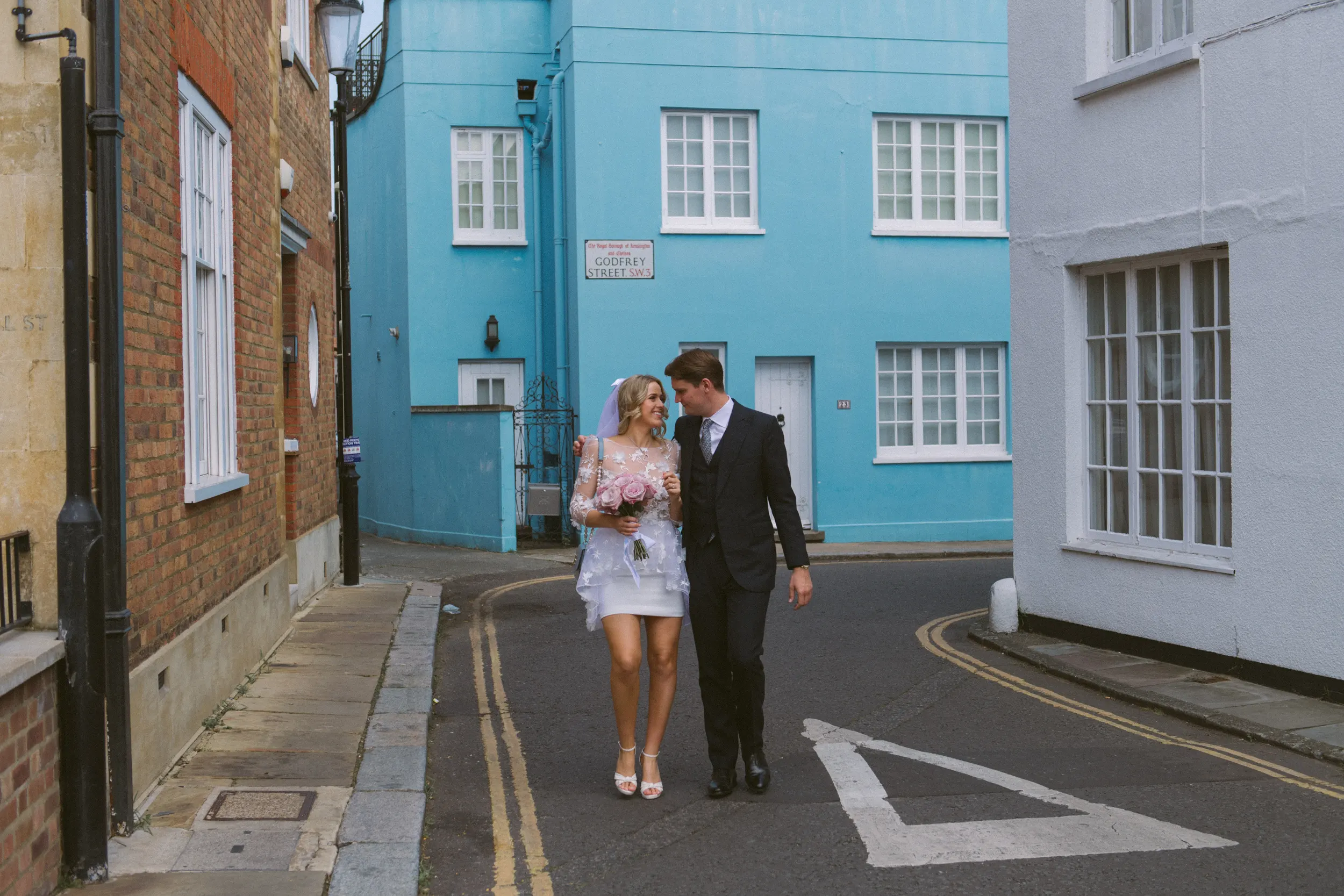 Chelsea wedding photography bride and groom in narrow streets after the wedding ceremony in Chelsea town hall