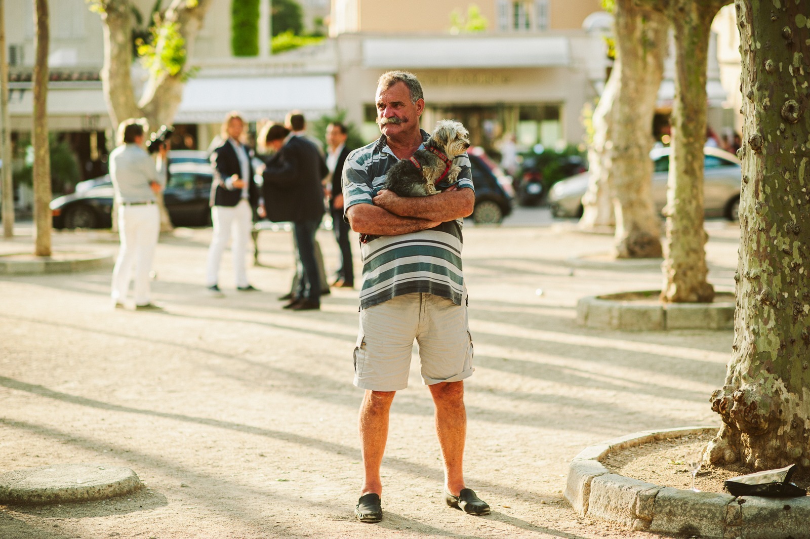 Wide view of Saint-Tropez square at sunset during rehearsal evening