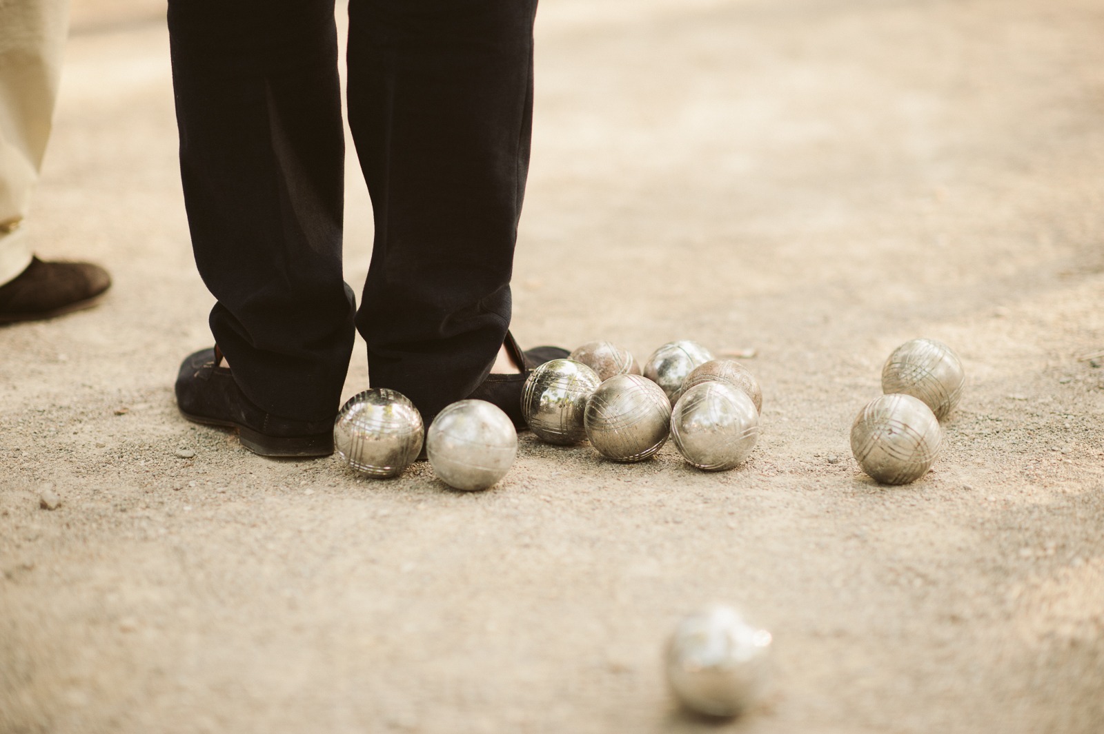 Bride and groom sitting together at rehearsal dinner table in Saint-Tropez