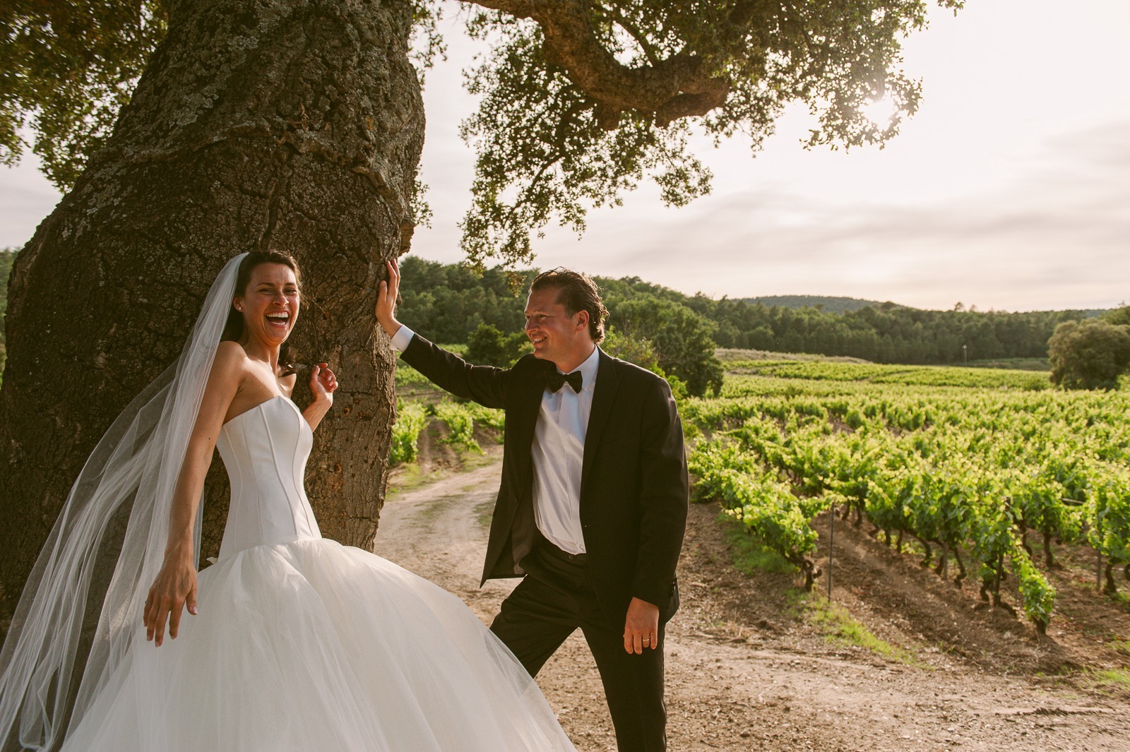 Bride twirling in vineyard dress near Saint-Tropez at sunset
