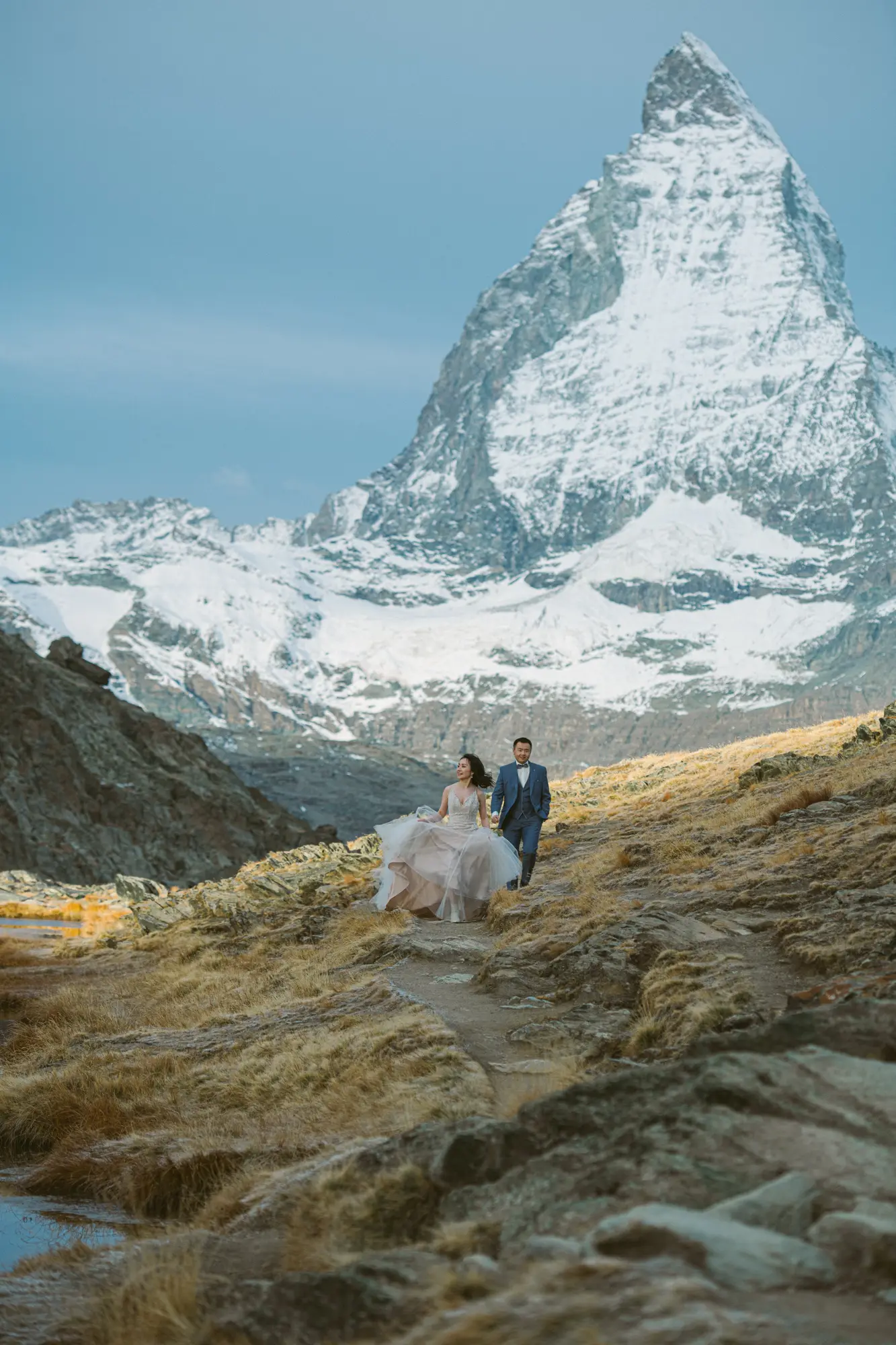 Cinematic pre-wedding couple in Europe at sunset by Janis Ratnieks