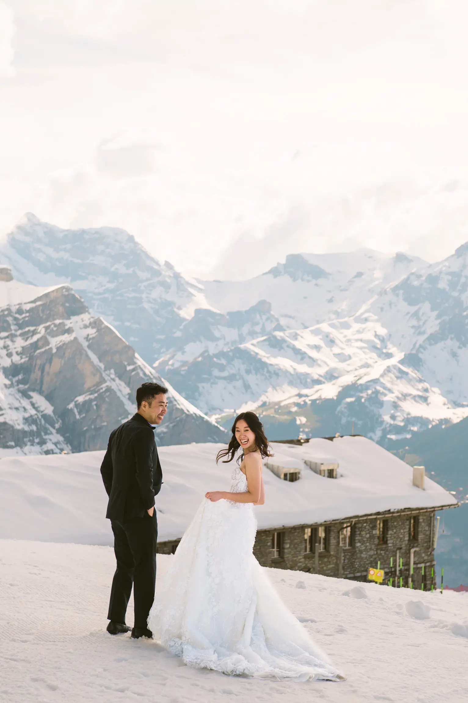 Pre-wedding couple on a mountain ridge in the Dolomites