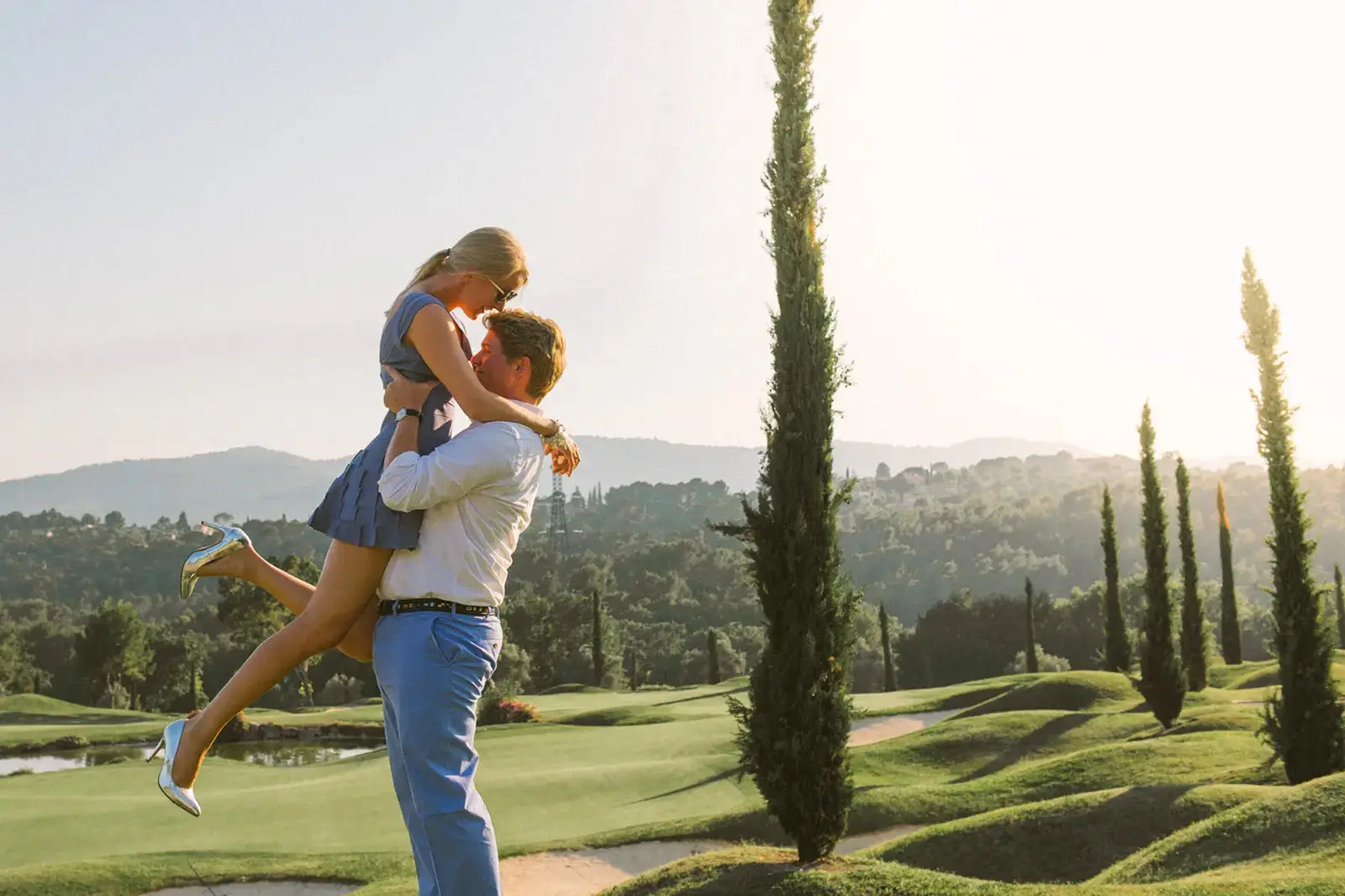 Bride and groom walking through the old village streets near Royal Mougins Golf Club