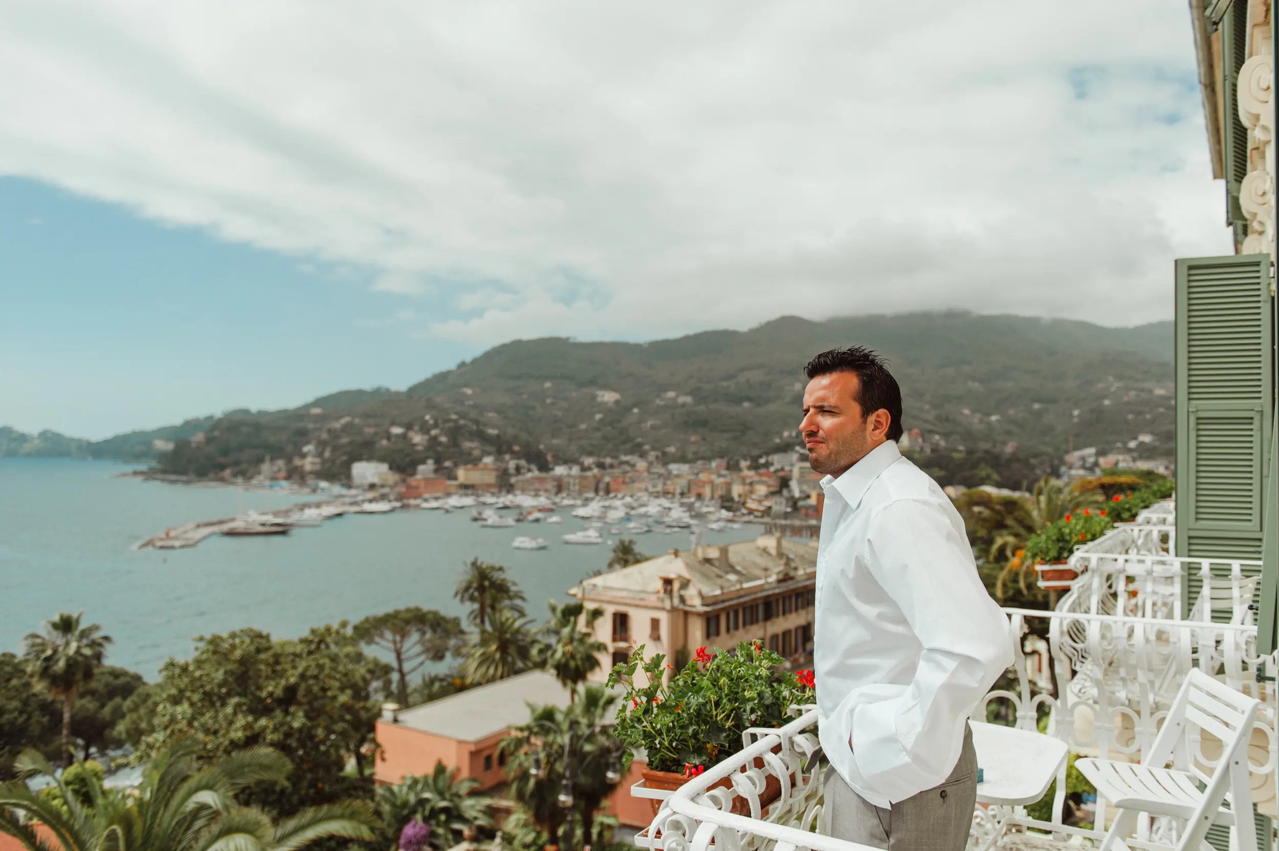 Groom on a balcony with a sea view at Hotel Splendido in Portofino